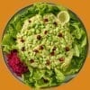 A plate of food with some lettuce and other vegetables